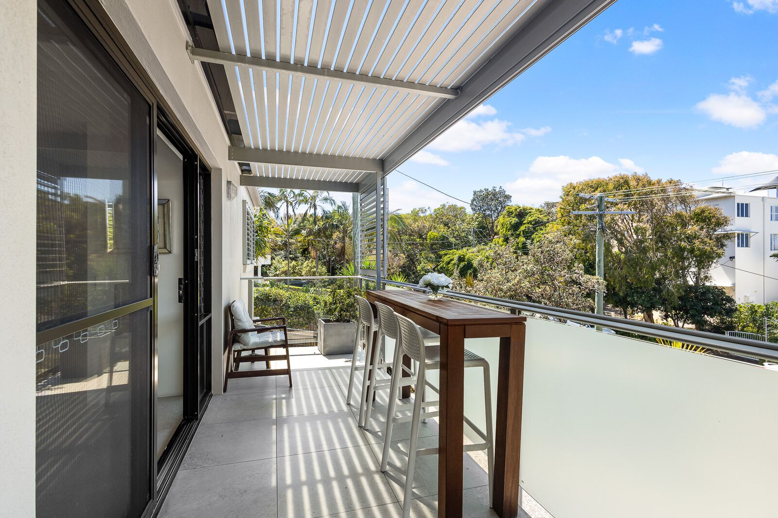 Unit 1 front balcony and breakfast bench